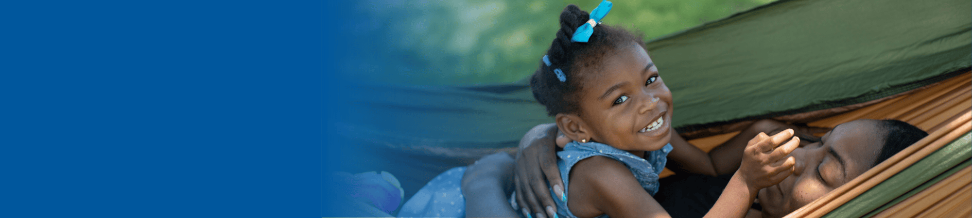 girl on hammock with caregiver