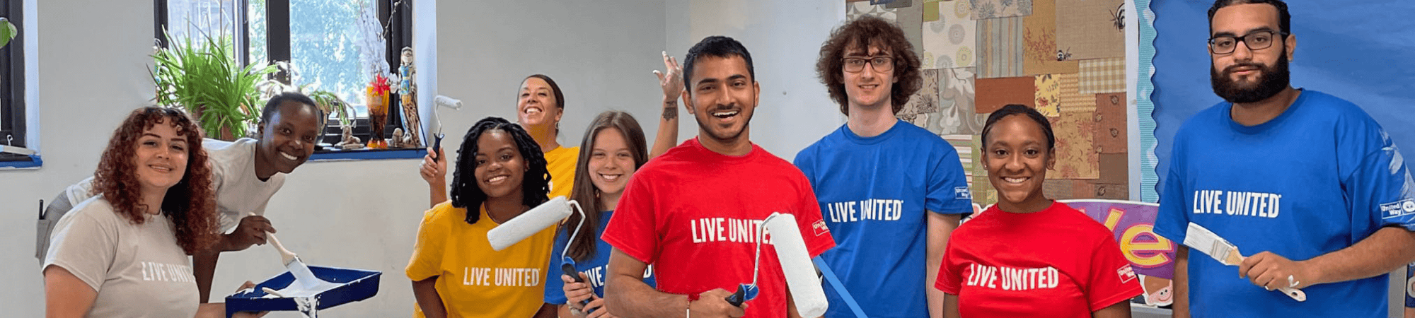 group of volunteers painting